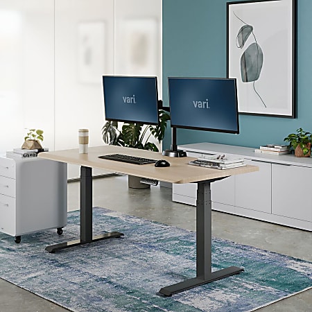 VARI Electric Standing Desk With ComfortEdge 60 W Light Wood VARI Electric Standing Desk With ComfortEdge 60 W Light Wood
