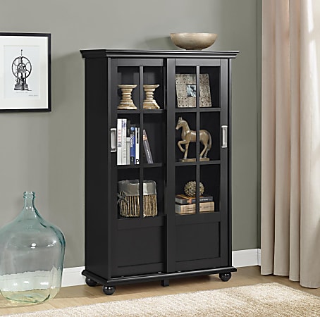 Black bookcase with glass doors top