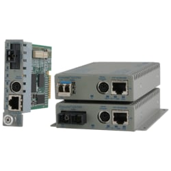 Omnitron Systems iConverter GX/TM2 Media Converter - 1 x Network (RJ-45) - 10/100/1000Base-T, 1000Base-X - 1 x Expansion Slots - 1 x SFP Slots - Desktop
